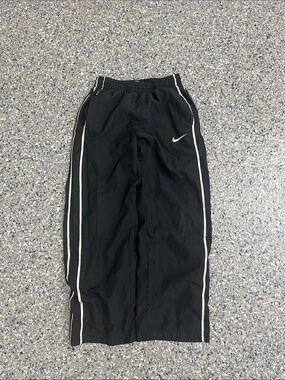 Black Nike track pants